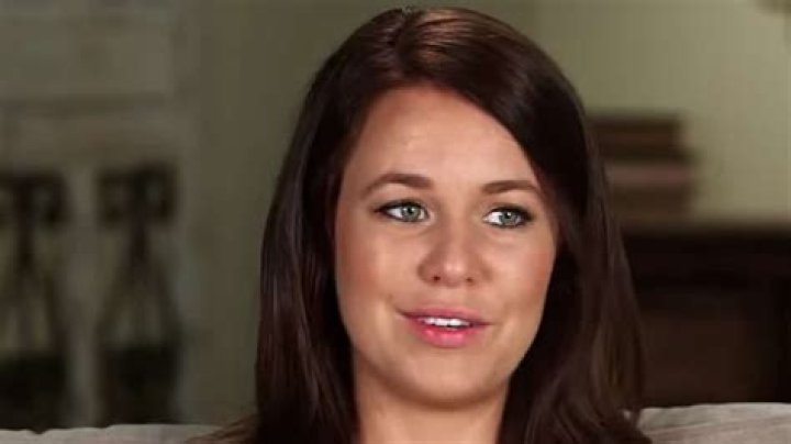 A still-single Jana Duggar wears ripped jeans while hanging out with sibling