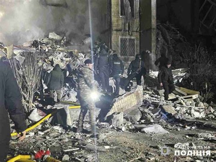 A woman clutching an infant is found in the rubble of Ukraine building after Russian drone strike