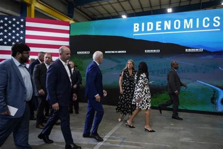 Biden chooses longtime aide who runs his Oval Office to be a deputy White House chief of staff