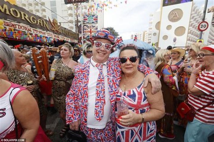 Brit expats and tourists parade in outrageously offensive costumes at Benidorm's annual ‘bad taste’ fancy dress contest