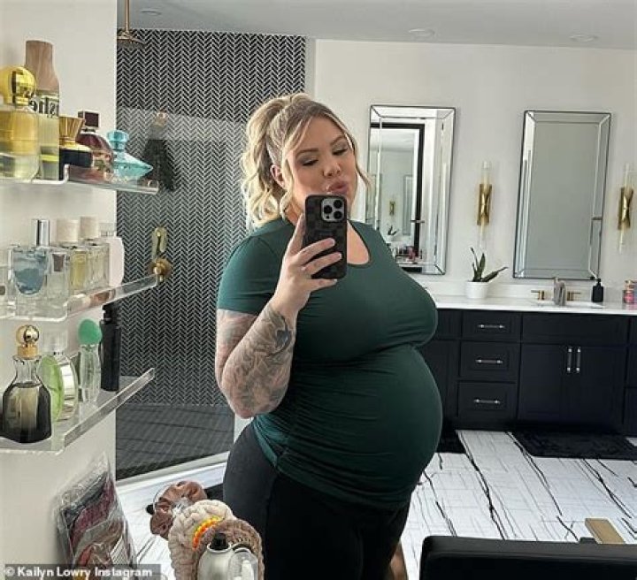 Daisy Lowe strips naked to show off her growing baby bump in mirror snap