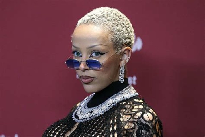 Doja Cat Wears Fake Eyebrows and Mustache at Paris Fashion Week