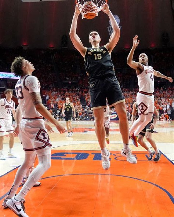 Edey helps rally No. 3 Purdue to 77-71 win at No. 12 Illinois to clinch outright Big Ten title