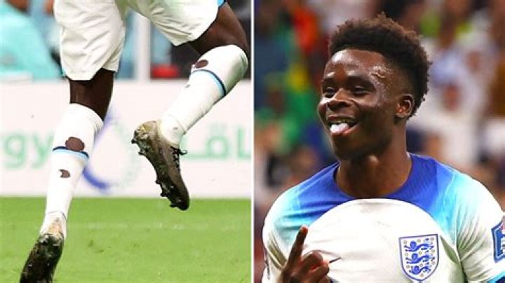 England and Arsenal star Bukayo Saka cuts holes in his socks - but why does he do this and who else does?