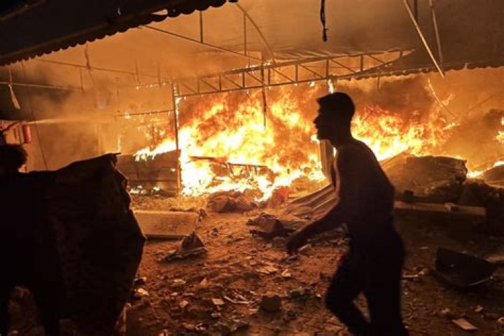 Fears grow people may have burned to death in Oldham paper mill blaze which forced evacuation from dozens of homes as 70 firefighters tackled huge fire