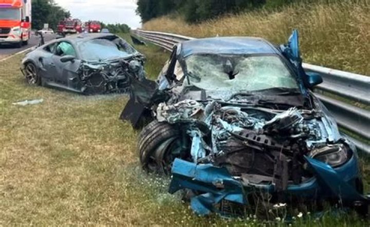 Ferrari driver held after his £225k supercar crashes with Peugeot 206 leaving wreckage 100 yards down road