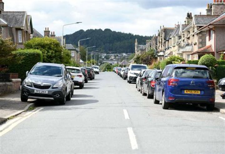 Furious residents must pay £35 to park outside their OWN homes