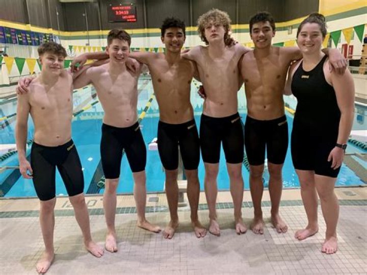 Go 4 It: Central swim team stars Mary and Abby Selden
