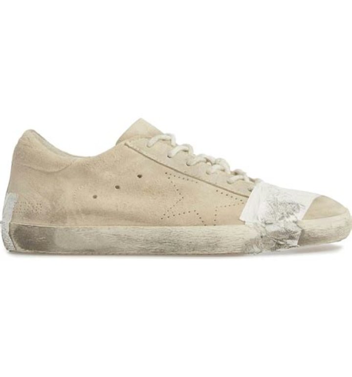 Golden Goose's Beat Up, Taped Sneakers Have The Internet Freaking Out