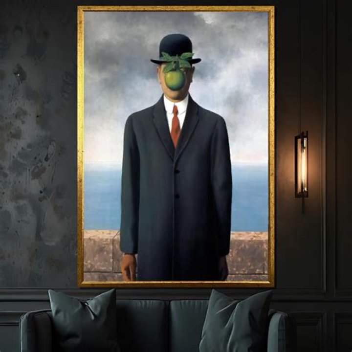 I spotted a mystery man in a bowler hat outside Banksy's famous artwork - I think he's the elusive artist