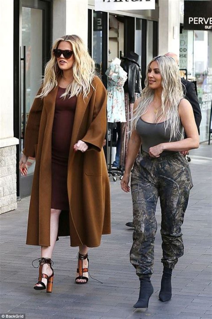 Kim Kardashian Shields Baby Bump, Khloe K Rips Step-Mom