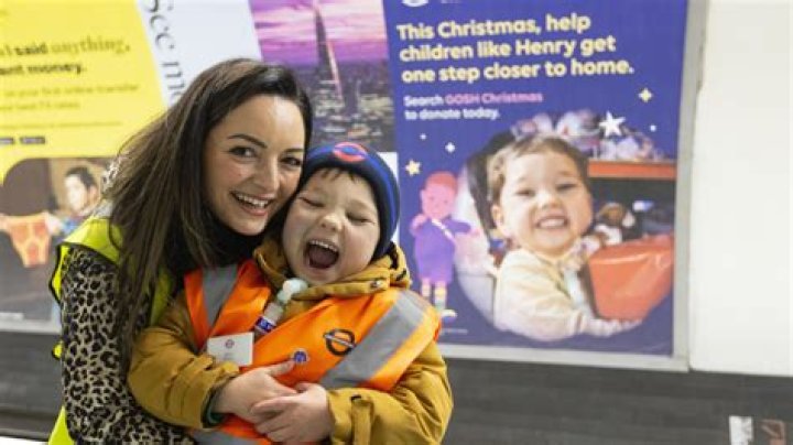 Lad, 6, who spent two Christmases in hospital beams with joy as he sees his face on festive Tube poster
