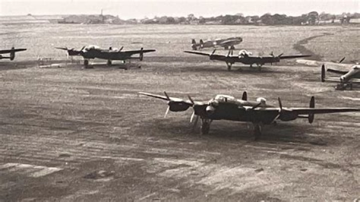Lancaster bomber crew show off giant bomb with 'Easter eggs for Hitler' painted on it in series of incredible photos revealing proud history of World War Two plane