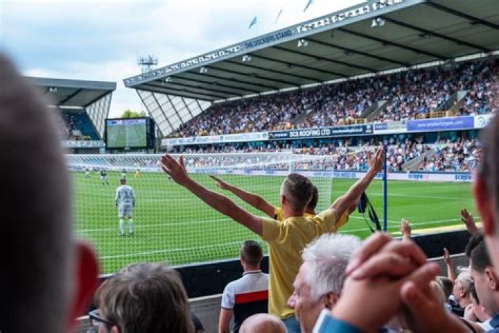 Leeds fans poke fun at Millwall supporter 'on a trampoline' as bizarre antics in stands go viral