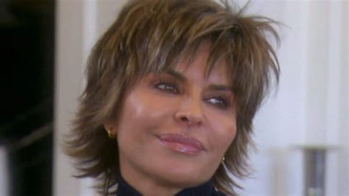 Lisa Rinna has a leg up at the dinner table for London Fashion week fun
