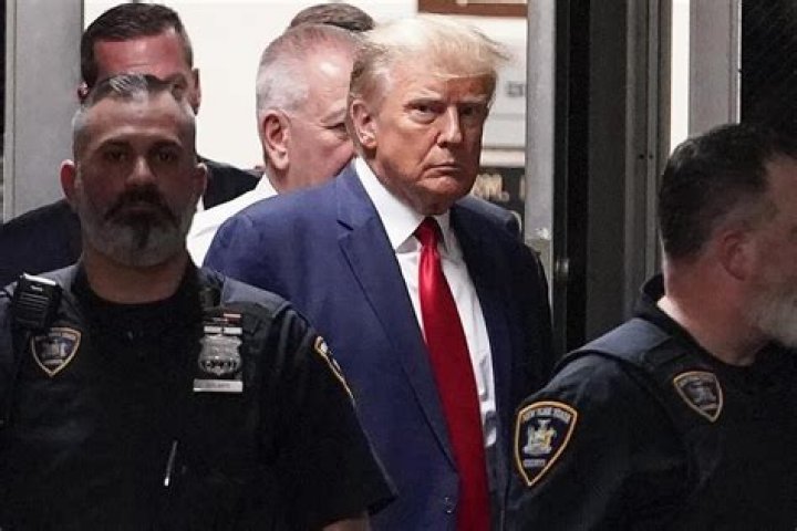 Mug shot of Donald Trump shows scowling former president during speedy booking at Atlanta jail
