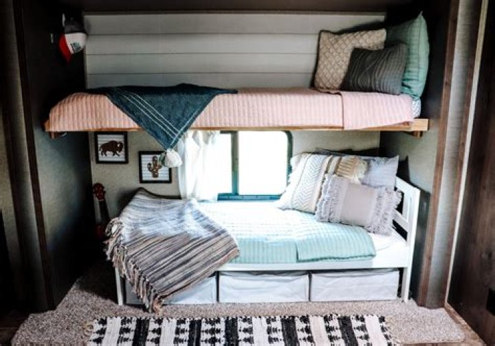 Mum upcycles boring MDF to create amazing bunk beds with two TVs for her kids - but trolls are out in force