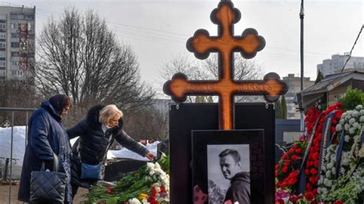 Navalny’s mother brings flowers to his grave a day after thousands attended his funeral in Moscow