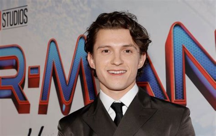 Photos Of Tom Holland With His Dog Through The Years