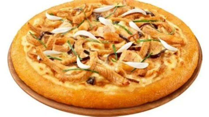 Pizza Hut reveals new SNAKE MEAT pie leaving fans horrified - but some say it tastes similar to much more common topping