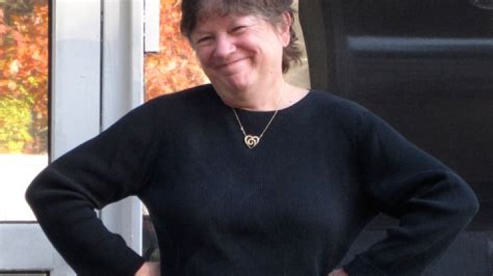 Police search for killer of retired Vermont college dean who was shot on trail near campus