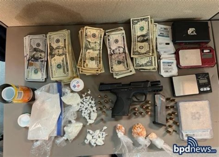Police: Suspect had loaded gun, drugs, more than $50,000 in cash