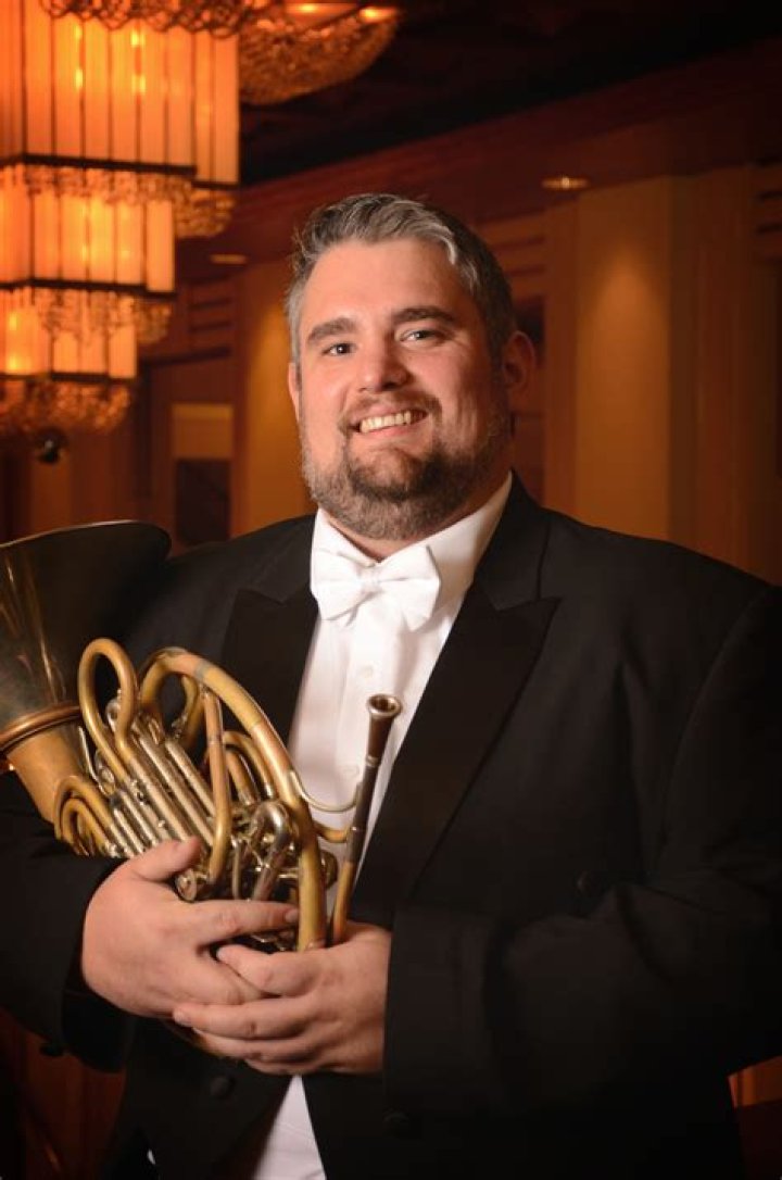 QCSO cheerleader toots his own horn with new job at WVIK