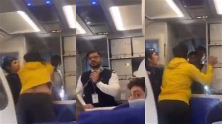 Shocking moment airport worker pictured ‘punching passenger holding a baby after he complains about 13-hour delay on easyJet flight'