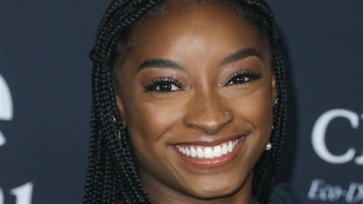 Simone Biles mistaken for a child on recent flight, offered a coloring book