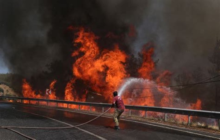 Terrified tourists airlifted & rescued by boats from Brit resorts near Marmaris as wildfires ravage Turkey killing six