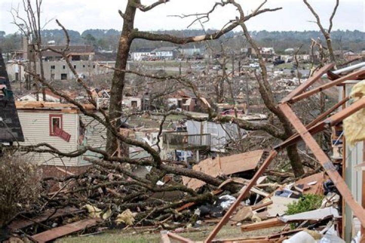 Tornado on the ground in QC area; severe damage in Henry County