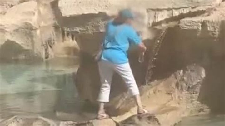Video of a tourist woman walks across ‘Trevi Fountain’ to fill water bottle sparks outrage