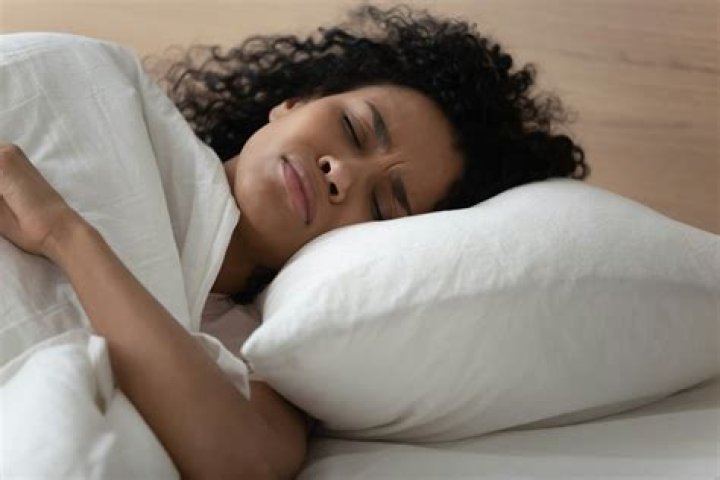 What Do Dreams About Going To The Bathroom Mean? Experts Explain