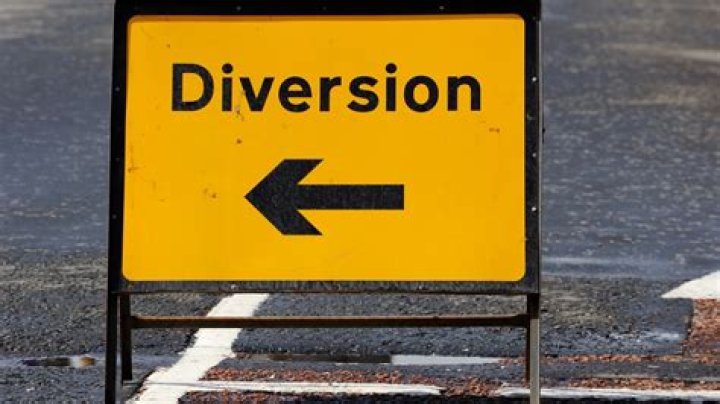 What do yellow road signs mean in the UK?