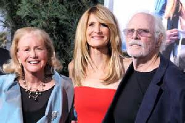 Who are Laura Woods' parents, Michelle and Steve Woods?