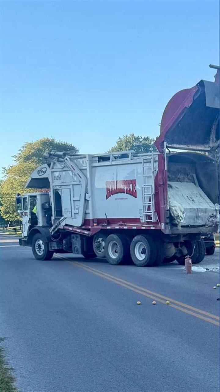 Woman tossing trash gets compacted inside garbage truck in New Hampshire