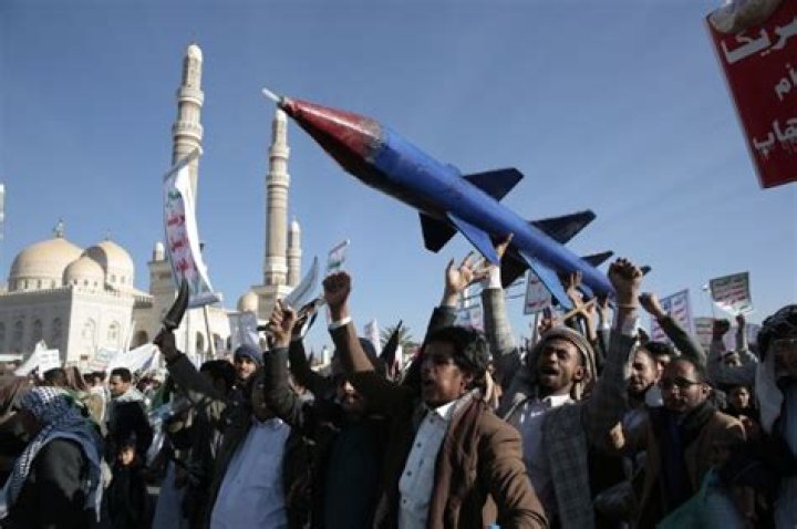 Yemen Houthi rebels fire a missile at a US warship, escalating worst Mideast sea conflict in decades